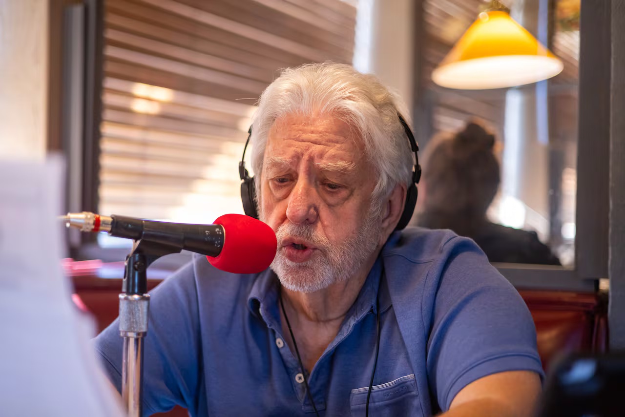 Al Wynn at the Coffee Break microphone.